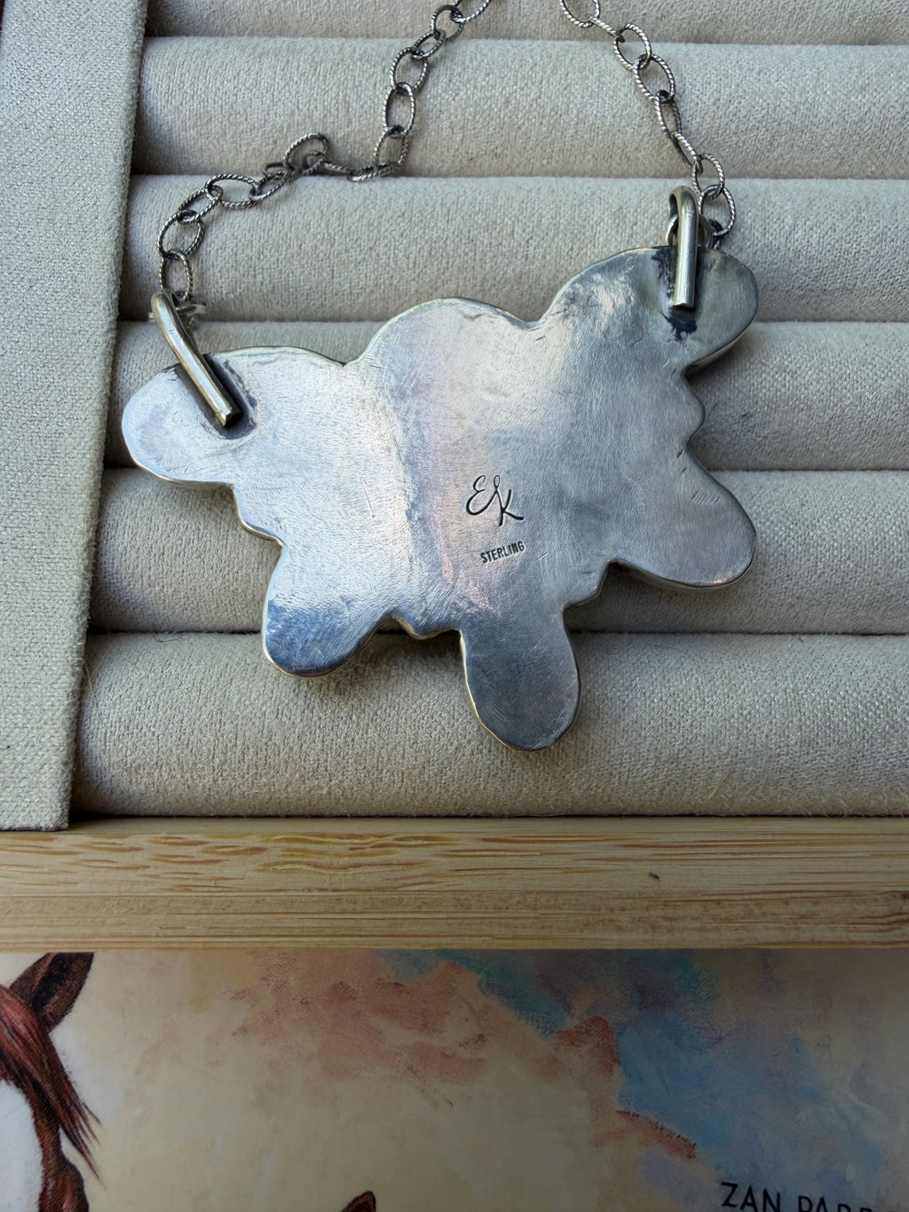 Royston Ribbon half cluster necklace