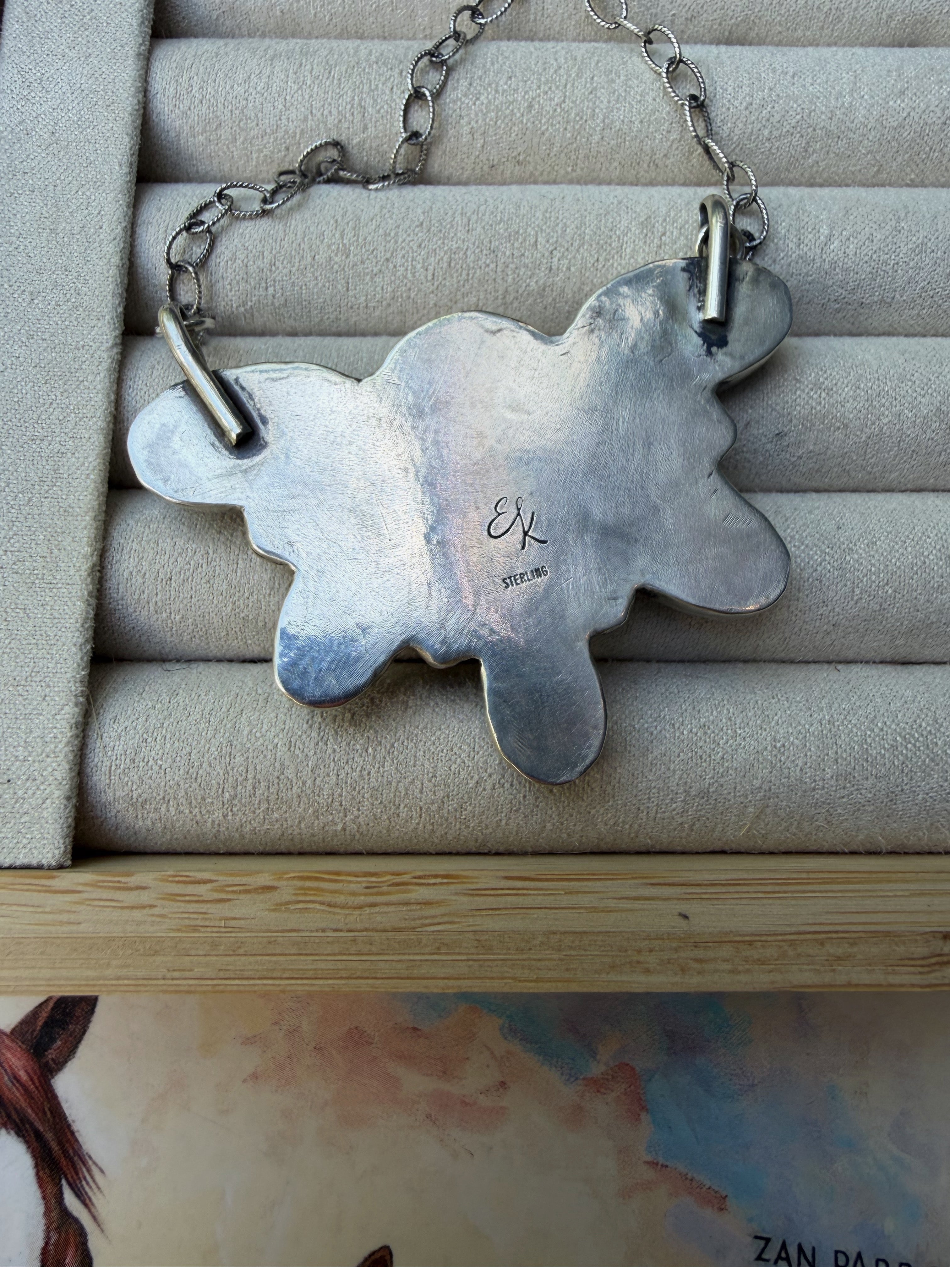 Royston Ribbon half cluster necklace