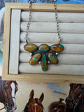 Royston Ribbon half cluster necklace